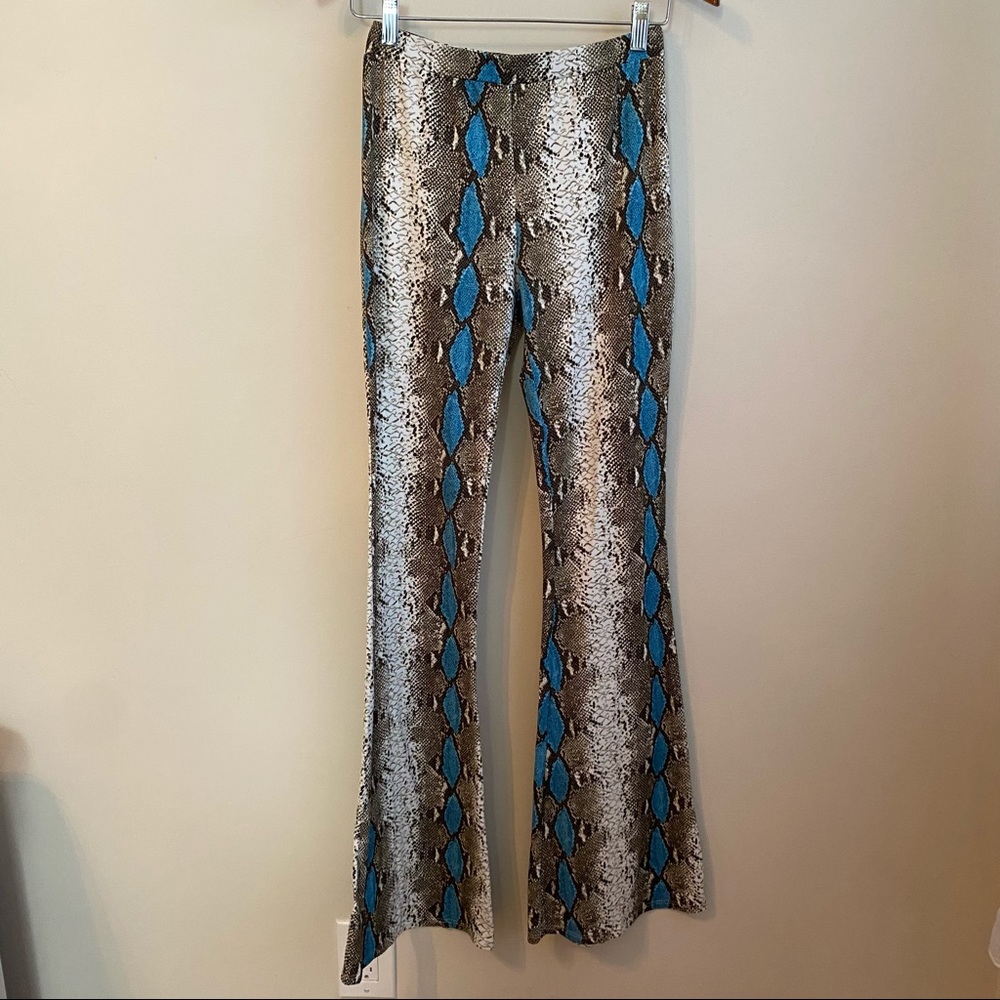 Love culture snake flare pants